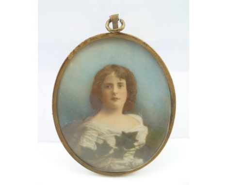 A LATE VICTORIAN OVAL MINIATURE PORTRAIT PAINTING of a young woman in a white gown, label verso reads; "Victoria Irene Brutto