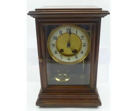 AN EDWARDIAN MAHOGANY CASED EIGHT DAY MANTEL CLOCK fitted glass panel door and glazed side panels, circular dial with Arabic 
