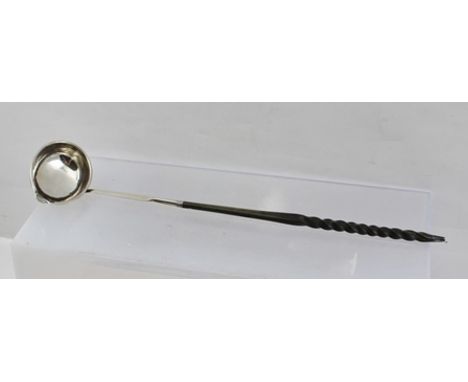 HESTER BATEMAN A GEORGE III SILVER LADLE with pouring spout, fitted with a twisted whale bone handle, hallmarks rubbed, circa