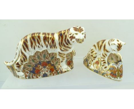 A ROYAL CROWN DERBY BENGAL TIGER CERAMIC PAPERWEIGHT with gold button, in original box, together with BENGAL TIGER CUB PAPERW