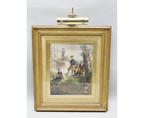 19TH CENTURY EUROPEAN SCHOOL "Boys playing and fishing on a river bank", a Watercolour painting, 49cm x 39cm, in ornate gilt 