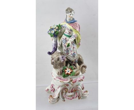 AN 18TH CENTURY BOW PORCELAIN FIGURE "Una and the Lion", allegorical image, she supports a cornucopia of flowers and fruits, 