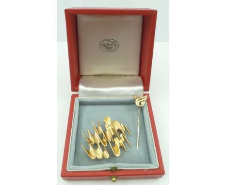 IVAN TARRATT A 9CT GOLD BROOCH designed by Ernest Blyth, a modernist design, together with a 9CT GOLD STICK PIN, combined wei