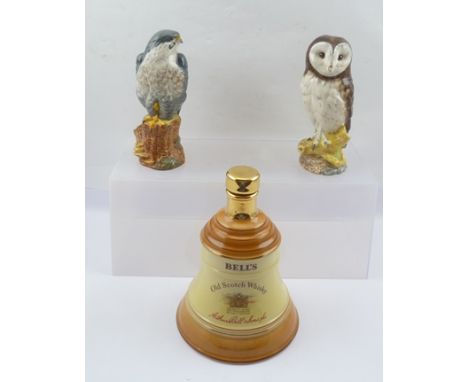 WHYTE & MACKAY SCOTCH WHISKY PEREGRINE FALCON AND BARN OWL DECANTERS 17cm high, together with a WADE PORCELAIN BELL'S OLD SCO