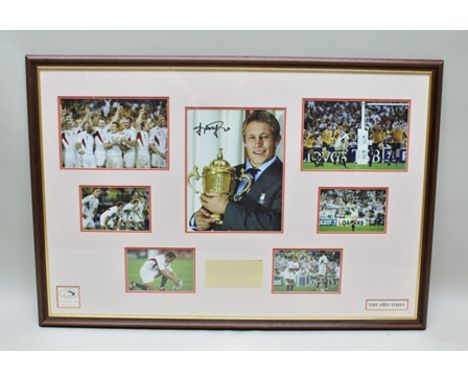 A FRAME OF PHOTOGRAPHS RELATING TO THE RUGBY WORLD CUP 2003, featuring Jonny Wilkinson, includes a signed portrait, certifica