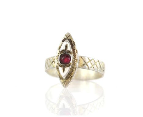 The Lord of the Rings - 'elvish' metal ring set with red stone, used as set dressing in Elrond's office/library in Rivendell.
