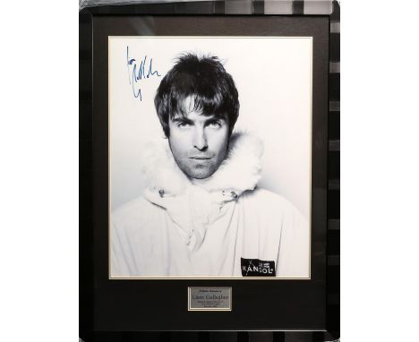 Liam Gallagher - autographed print with Gallagher's signature in blue pen obtained by his driver in his car at Heathrow Airpo