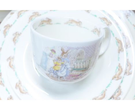 Royal Doulton Bunnykins items to include - teapot, cups and saucers, plates, bowls, money boxes & a two tier cake stand. 