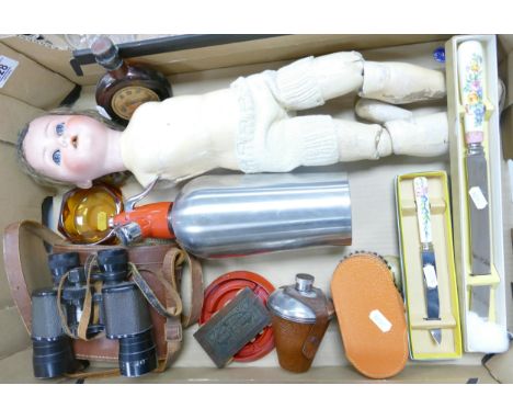 A mixed collection of items to include cased vintage binoculars, vintage travel cup, Victorian German Bisque Headed Doll, Pot