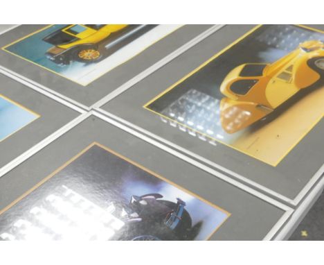 A set of eleven Classical Car theme Framed prints taken from the Ford  Calendar, each 39 x 65cm, together with a Mike Jackson