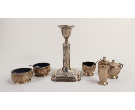 A collection of silver items including 5 piece cruet, solid silver 198g, and Silver filled candlestick. (6) 