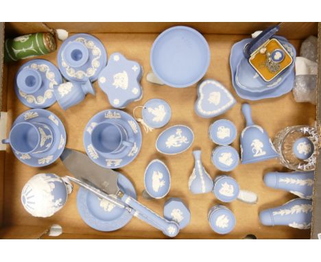 A collection of Wedgwood Blue Jasper Ware including  lidded boxes, pin trays, pill boxes , coffee cans & saucers, cutlery etc