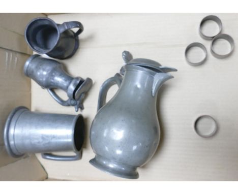 A collection of vintage pewter including jugs, tankards together with enameled copper napkin rings 