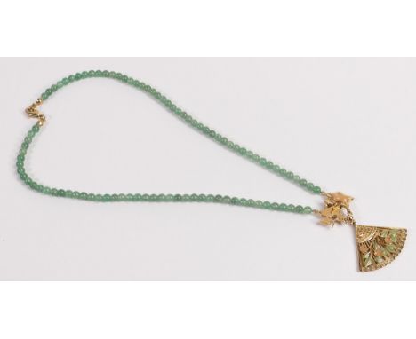 Green beads choker with heavy gold plated pendant and pendant fittings with enamel decoration.  Wearable Length 42cm appx. 