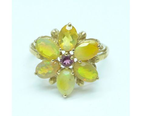 A 9ct gold, opal and tourmaline ring, 2.7g, O