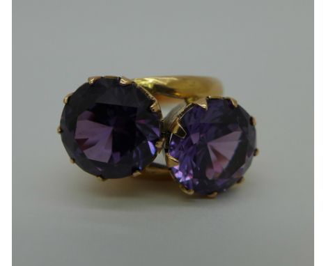 A 14ct rose gold, two stone colour change amethyst ring, 4.7g, K, continental control marks