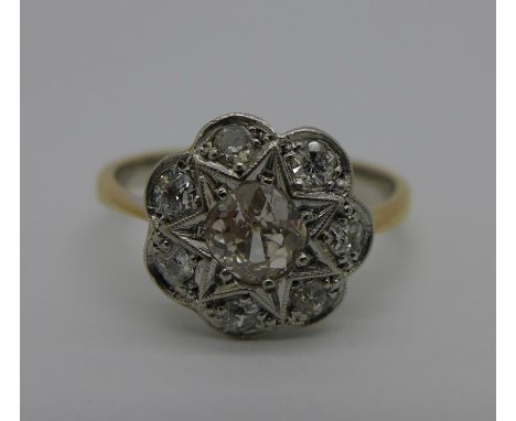 An 18ct gold Art Deco cluster ring set with old mine cut diamond centre stone, c.1920's, approximately 0.50 carat diamond wei