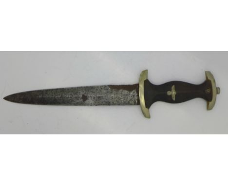 A German RZM SS dagger, lacking scabbard, inscribed SS Nm. 139267, the blade marked RZM, and also 1/38 partially obscured by 