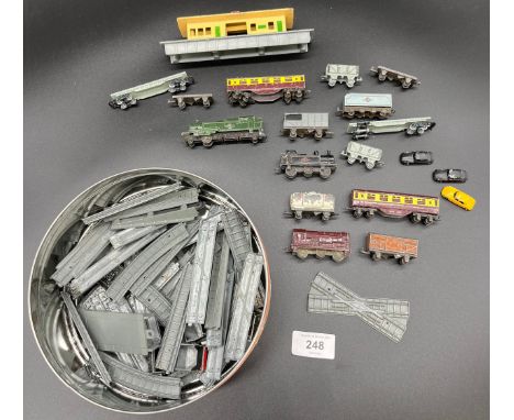 A Vintage Lone Star mini train set with track, various carriages and small lone star cars etc 