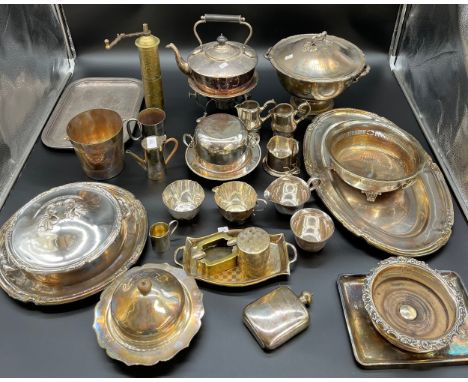 A selection of silver plated and E.P Wares to include serving tureens, platters, spirit kettle, sugar and creams, hip flask a