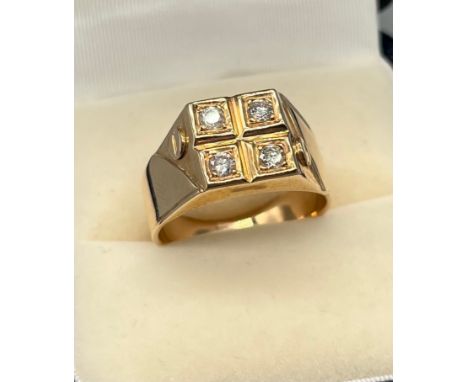 A Gold gents four diamond stone ring. Stamped 14. [6.25grams] [Ring size- R] 