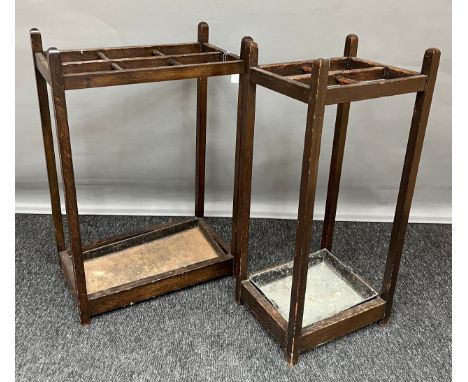 A Lot of two Oak art deco stick stands with tray inserts. 