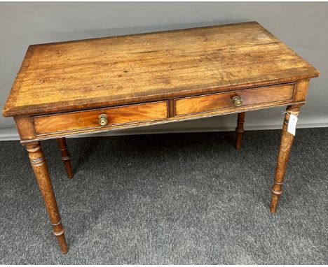 An 19th century mahogany made writing desk/ console table. Two frieze drawers with turned leg supports. 
