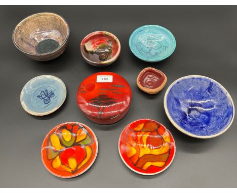 A Lot of studio pottery items and poole pottery items. Includes African sky 14cm trinket box. 