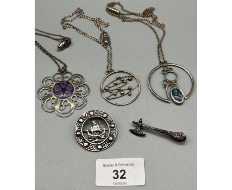 A Lot of silver jewellery to include three pendants with chains and two Celtic design brooches. 