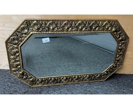 A Vintage Arts and crafts style brass raised relief framed mirror. [44x74cm] 