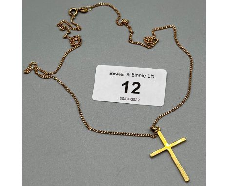 18ct yellow gold cross pendant with a 9ct yellow gold chain. [4.58grams] [48cm in length] 