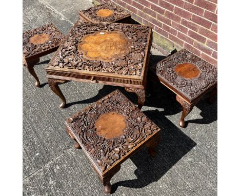 A Vintage highly decorative and carved coffee table designed with four drawers, Together with four matching side tables. [50x