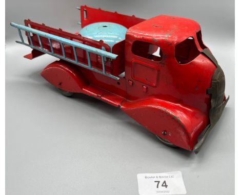 A Vintage tin plate red truck with bell mechanism. [11x26x12cm] 