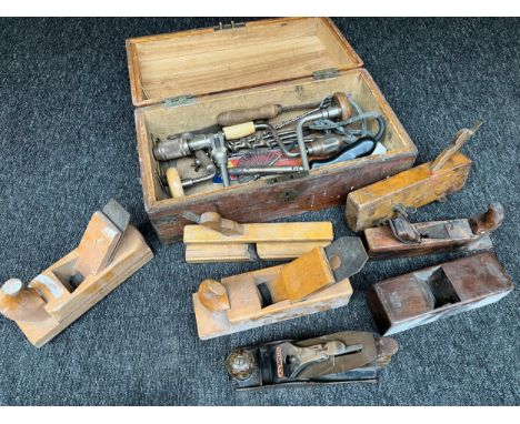 A Lightwood chest containing vintage joiners tools to include wooden planes, Stanley planer, drill bits and hand drills 