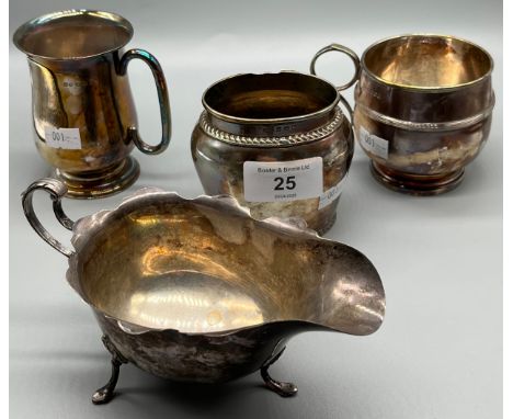 A Selection of silver marked items to include Sheffield silver Mappin &amp; Webb three foot gravy boat, Walker &amp; hall She