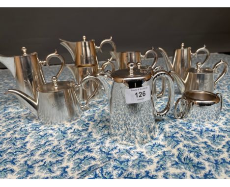 A Quantity of vintage silver plated/ E.P Tea/ coffee pots with engraved 'patisserie de l' Opera' to the front of some. 