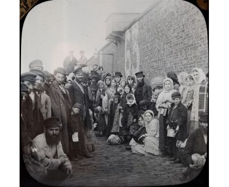 ASSORTED MAGIC LANTERN SLIDES comprising topographical, portrait and other subjects, including a hand-painted part set of Dic
