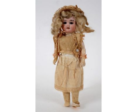 AN ARMAND MARSEILLE BISQUE SOCKET HEAD DOLL with a long curled blonde wig, sleeping brown glass eyes, and an open mouth with 