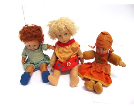 THREE CLOTH DOLLS comprising a felted cloth Norah Wellings, with painted hair and facial features, with an integrally fashion