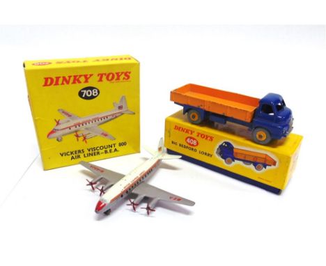 TWO DINKY DIECAST MODELS comprising a No.408, Big Bedford Lorry, blue with a yellow rear, yellow grooved hubs, generally good