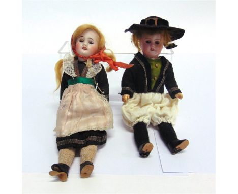 A PAIR OF SOCIETE FRANCAISE DE FABRICATION DE BEBES & JOUETS BISQUE SOCKET HEAD DOLLS one with a cropped brown wig, sleeping 