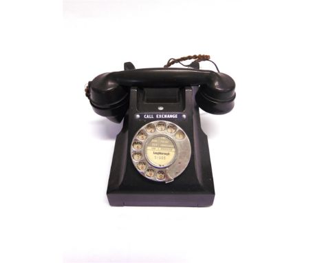 A G.P.O. TYPE 312 TELEPHONE black, the base marked 'A P M T', refurbished in the 1960s.