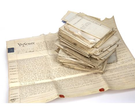 A bundle of 18th/19th century manuscript vellum/parchment deeds, conveyances etc (c40)