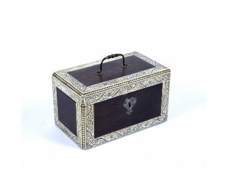 A 19th century Anglo Indian Colonial hardwood tea caddy, with Vizagapatan style incised ivory wide borders, and white metal h