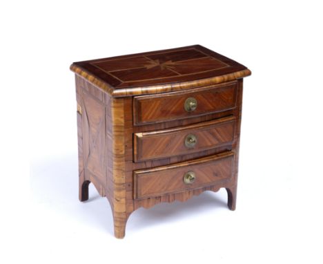 A 19th century French Kingwood veneered and inlaid miniature commode chest of three drawers, on bracket feet, 27.5cm wide