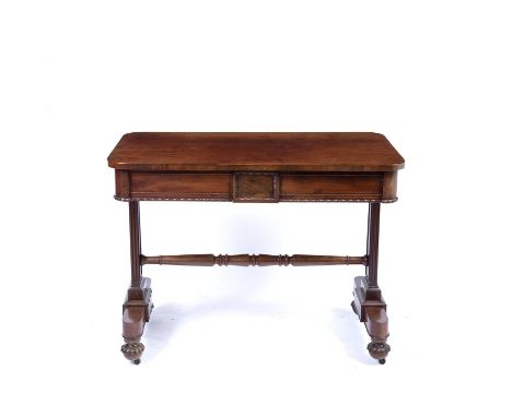 A George IV rectangular mahogany library table, the top with rounded ends above two frieze drawers and flat square section ta