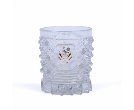 A 19th century French commemorative glass tumbler, of heavy moulded form, inset with a gold foil and coloured enamel cockerel