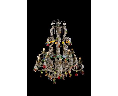 Twelve-light chandelier on two iron stages with colored glass beads and fruit-shaped pendants. Late 19th century. Minor defec