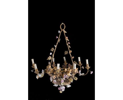 Eight-light basket chandelier in iron and carved and gilded wood with porcelain flowers. Early 19th century. Minor defects. 1