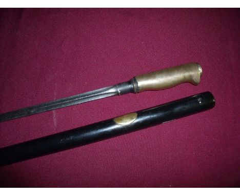 Unusual early 20th C sword stick converted from a Lebel bayonet, within ebonised stick case (overall length 81cm) 